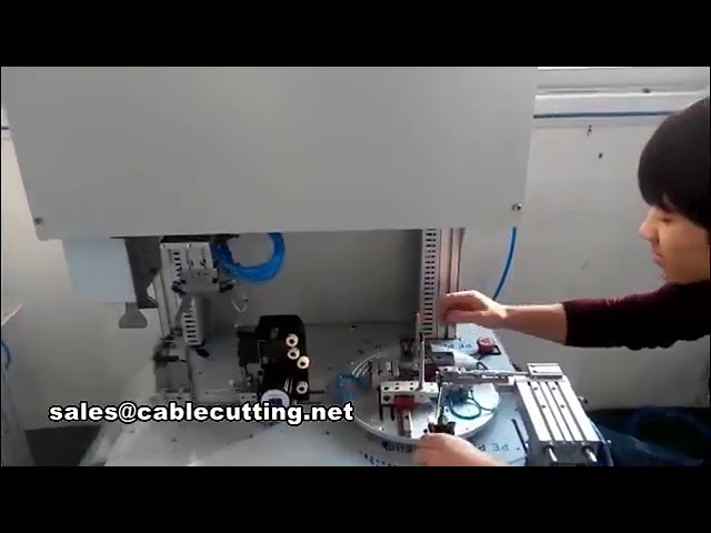 Machine automatique d'enroulement et ligature pour petits câbles et fils de souris