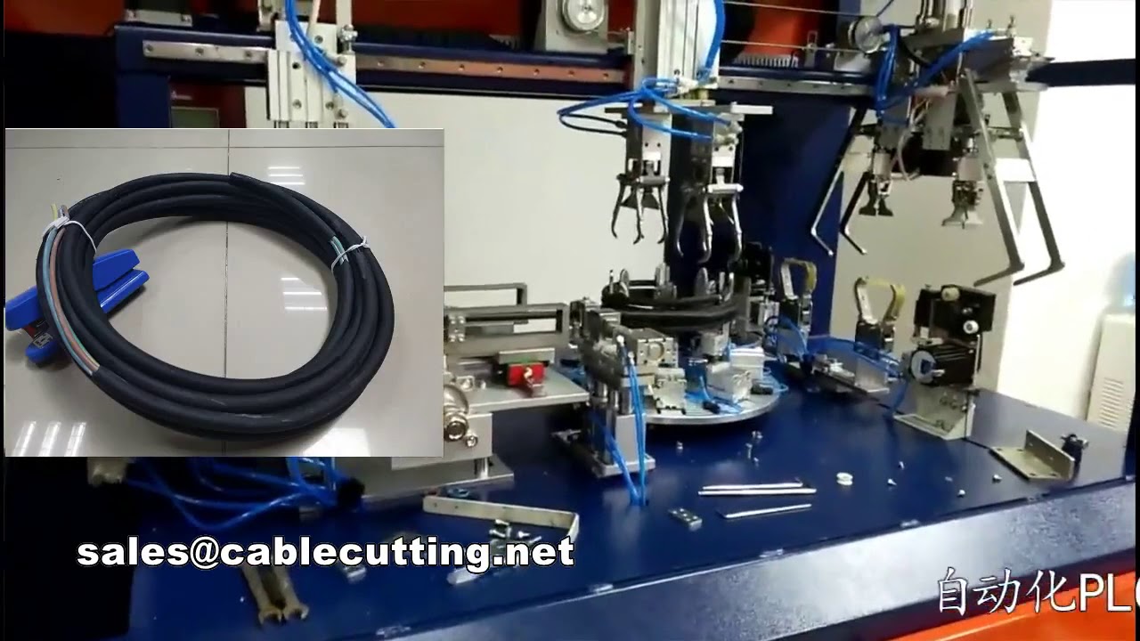 Machine entièrement automatique pour la coupe, le dénudage, l'enroulage, le bobinage et le ligaturage de câbles et fils