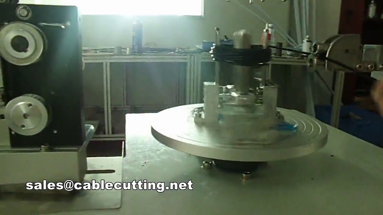 Machine automatique d'enroulement et de ligature de bobines rondes haute vitesse