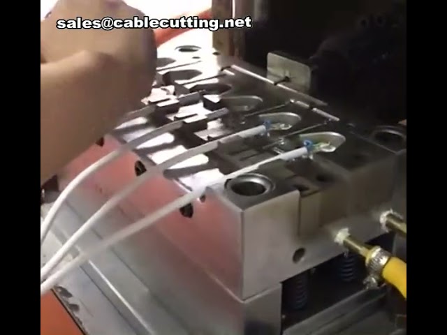 Pièces d'injection, machine de moulage par injection, processus de fabrication de câbles de données